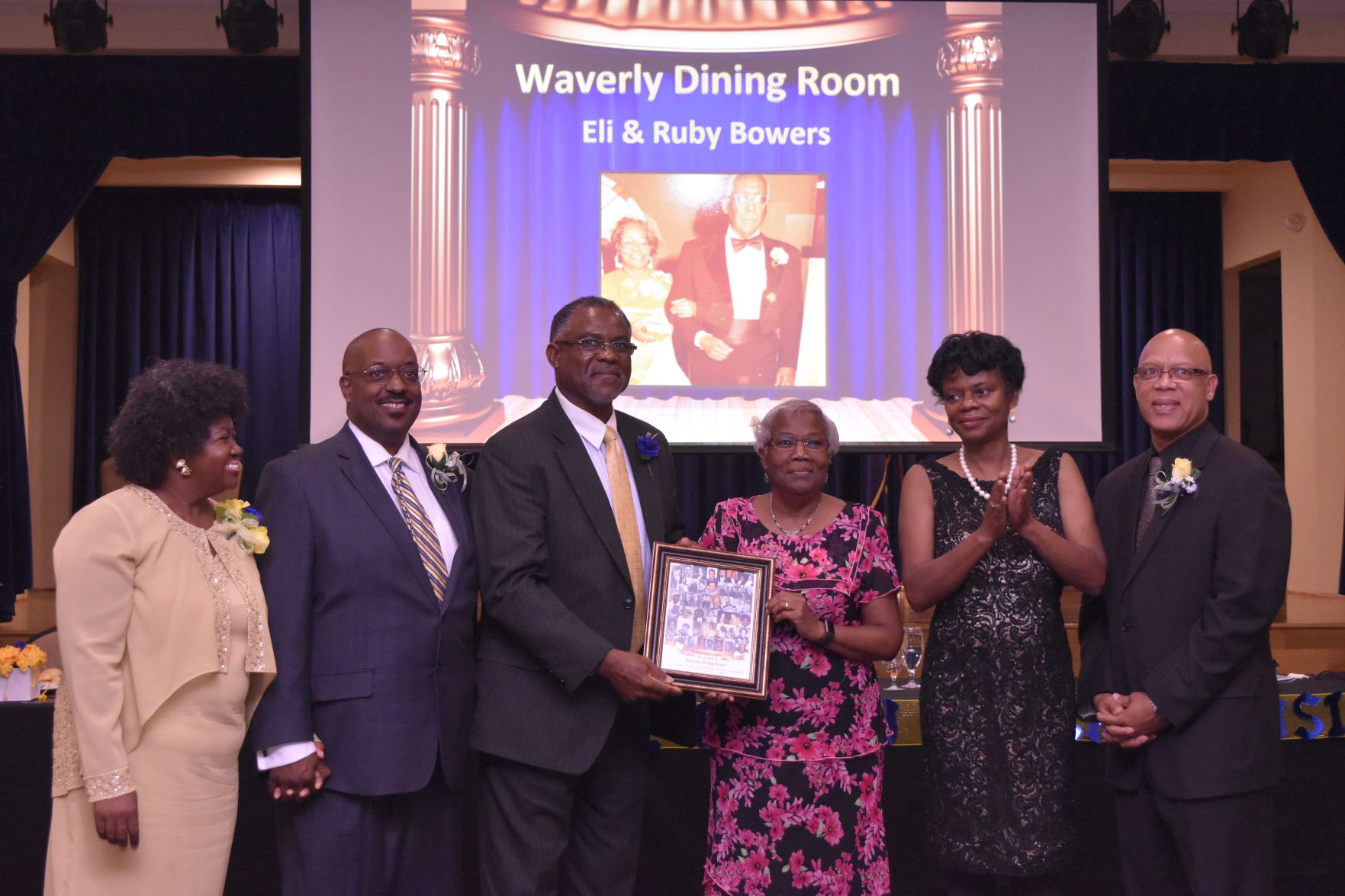 Tony Bowers and Delores Herbert accepts Legacy Award for the Waverly Dining Room.